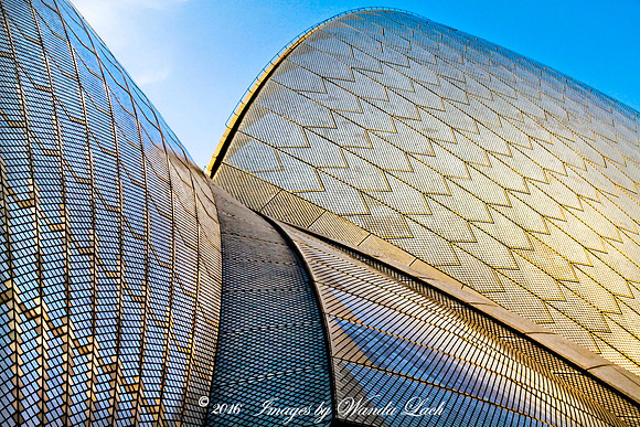 Opera house reflecting sky web